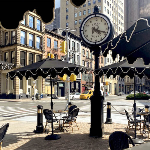 Out door plaza with black umbrellas and seating