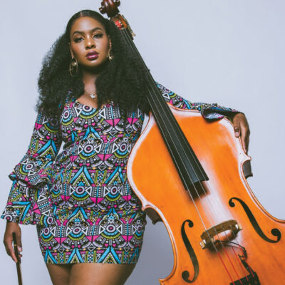 a headshot of bassist Endea Owens for her live performance at the Django