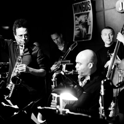 a headshot of the Mingus Orchestra performing
