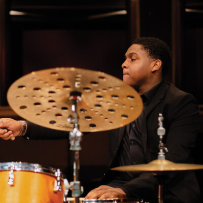 Domo Branch playing the drums