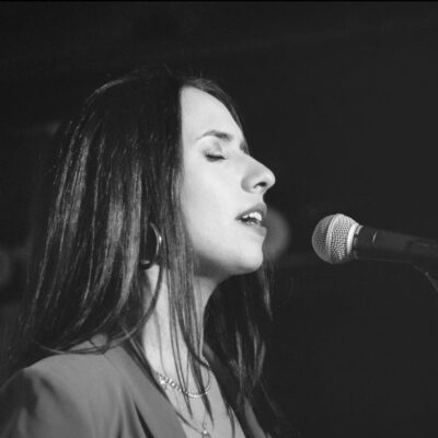 Portrait of Vanessa Perea singing